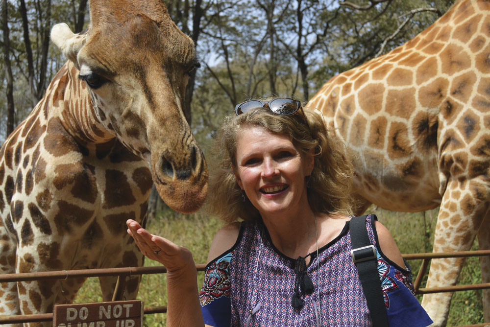 Travel writer Tracy Brooks with giraffes at Kruger National Park