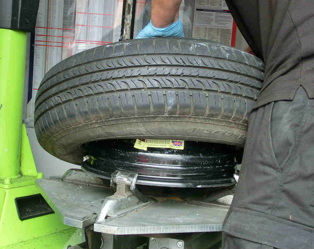 Tyre band removed to fit new tyre