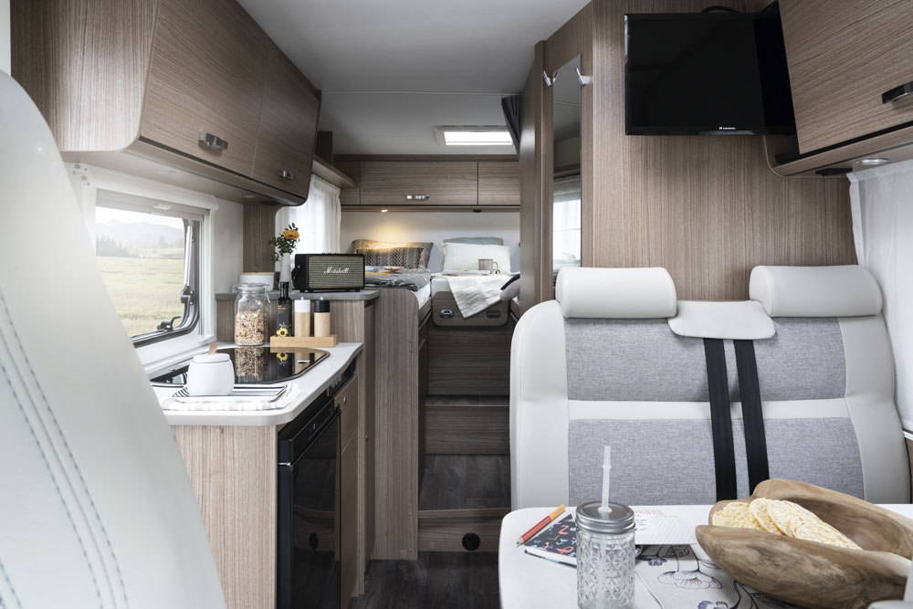 The kitchen and lounge area in the Carado V 337 motorhome