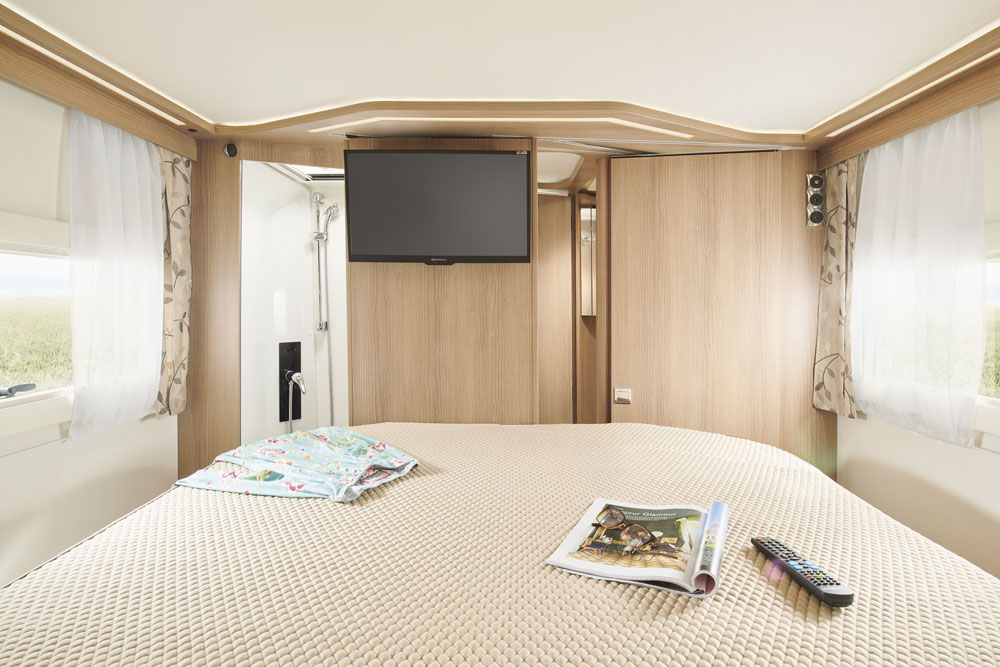 The bedroom in the Malibu I 500 QB motorhome, with TV