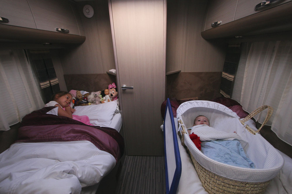 Single beds in a campervan