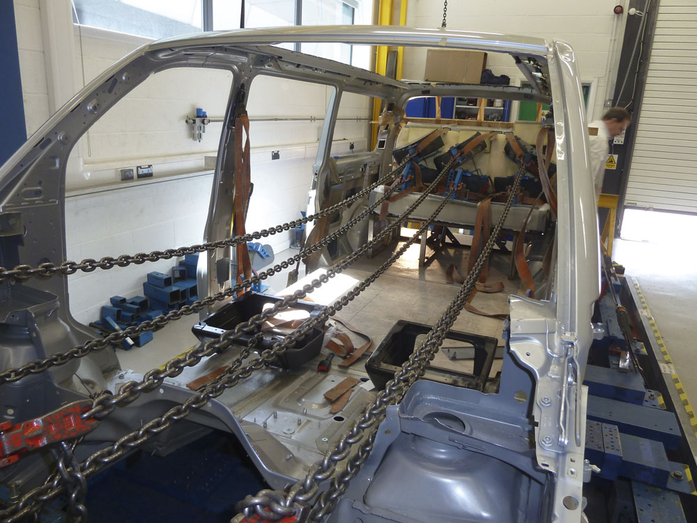 Rear seat loading test in a vehicle shell is required for Type Approval