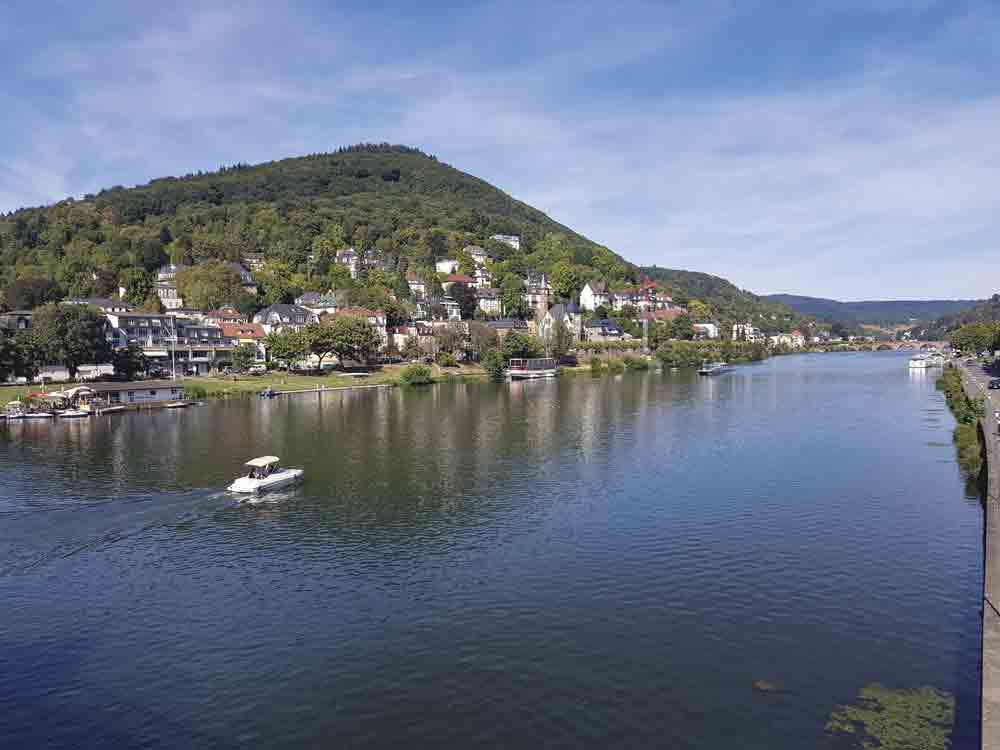 Image of the Neckar river in Germany, with the town of Heidelberg visible on the left