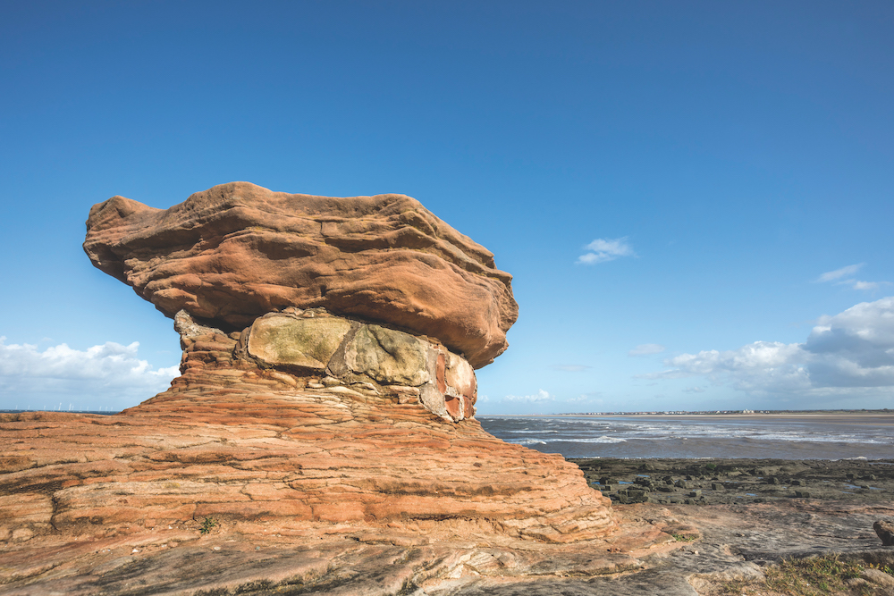 The red sandstone of Hilbre Island is sculpted by wind