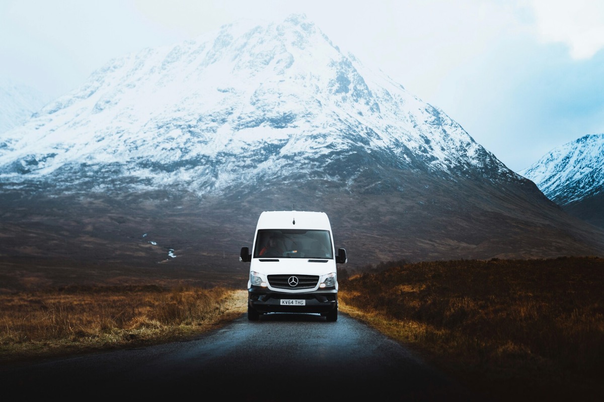 A campervan in the snowy mountains