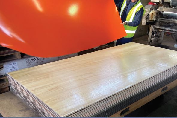 Superva Orange placed onto plywood