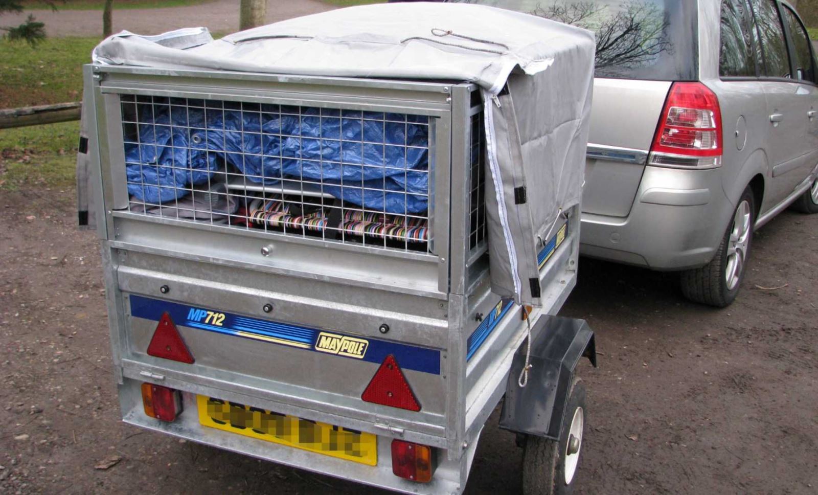 A camping trailer mesh cage
