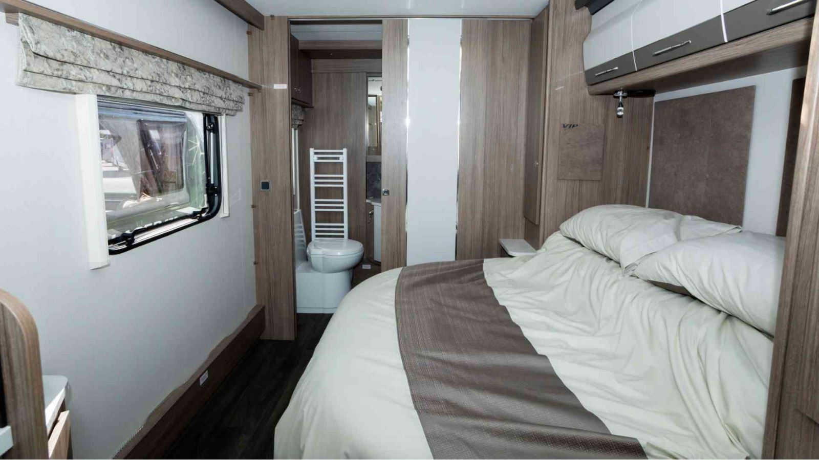 The bedroom inside the Coachman VIP 575