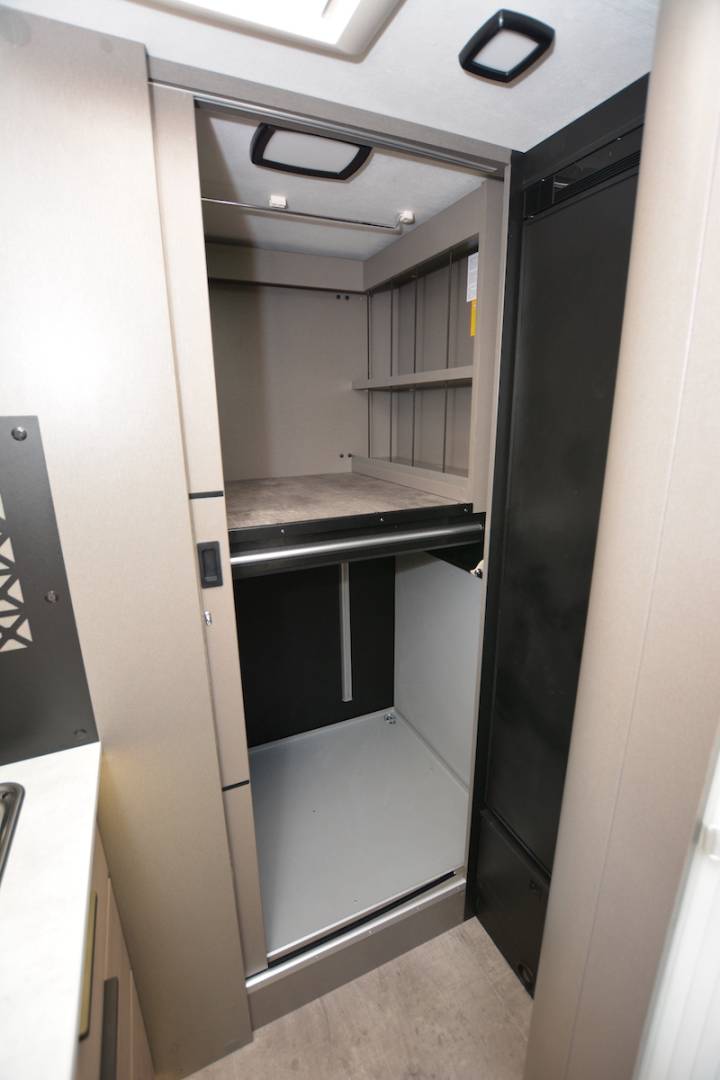 The wardrobe sits above the garage in the new Chausson X650 motorhome...