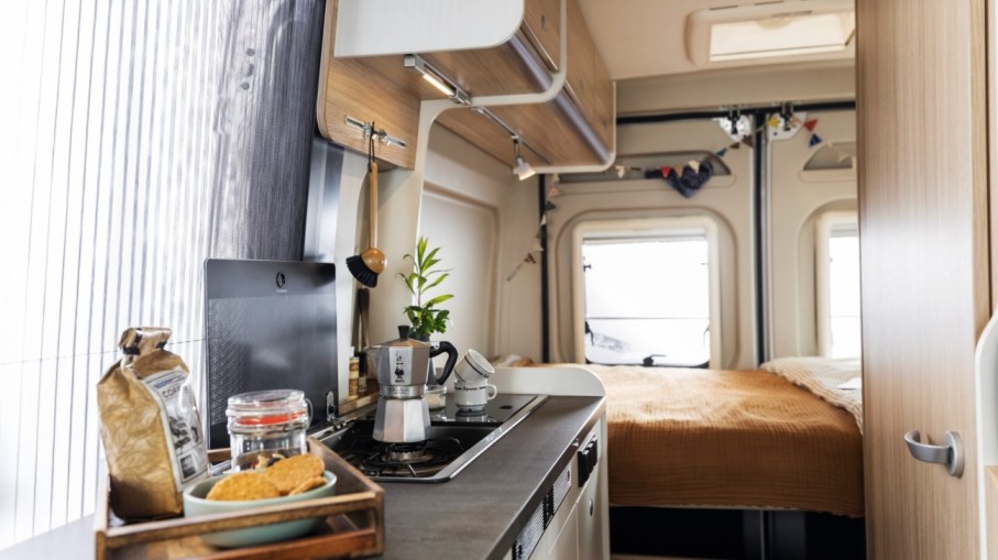 The kitchen and bedroom inside Cliff campervans