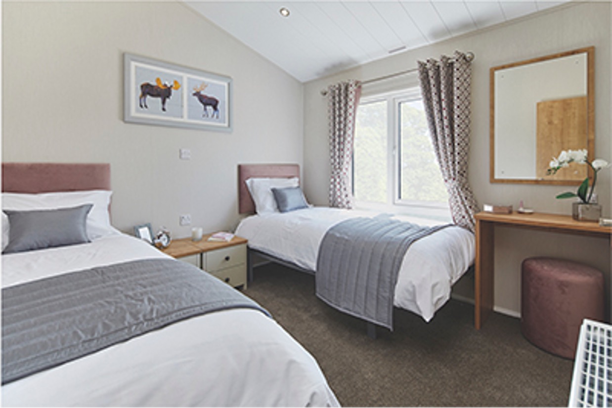 The bedroom inside the Willerby Portland