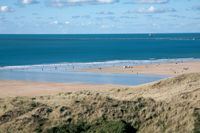 Woolacombe's expanse of sand sheltered by dunes Woolacombe's expanse of sand sheltered by dunes