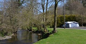 Waterside pitches at Exe Valley Caravan Site