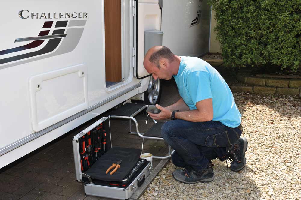 inspect the inner and outer caravan door lock mechanism