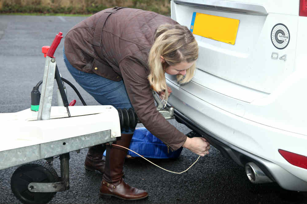 Sally hooks up the caravan’s electrics