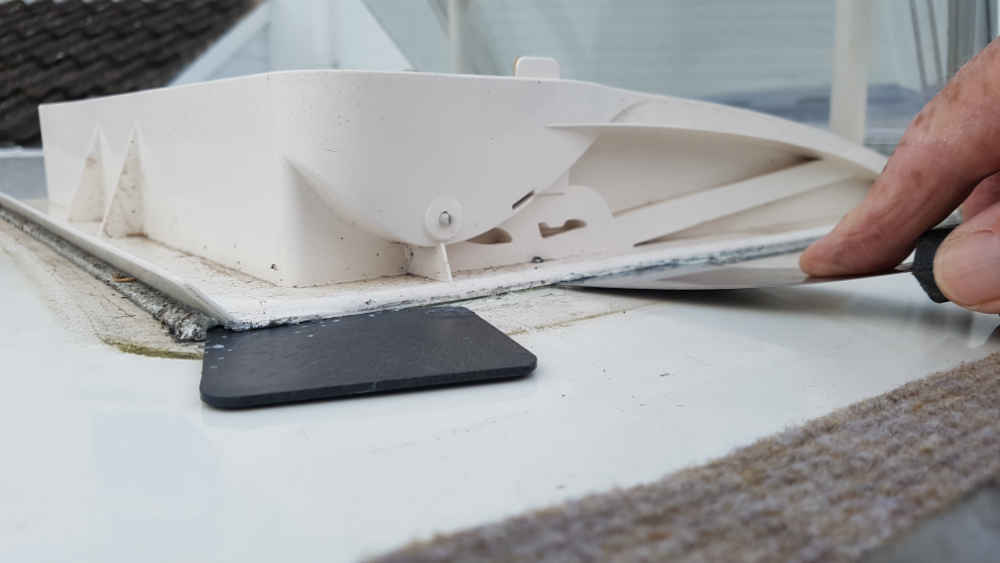 Push scraper under the edge