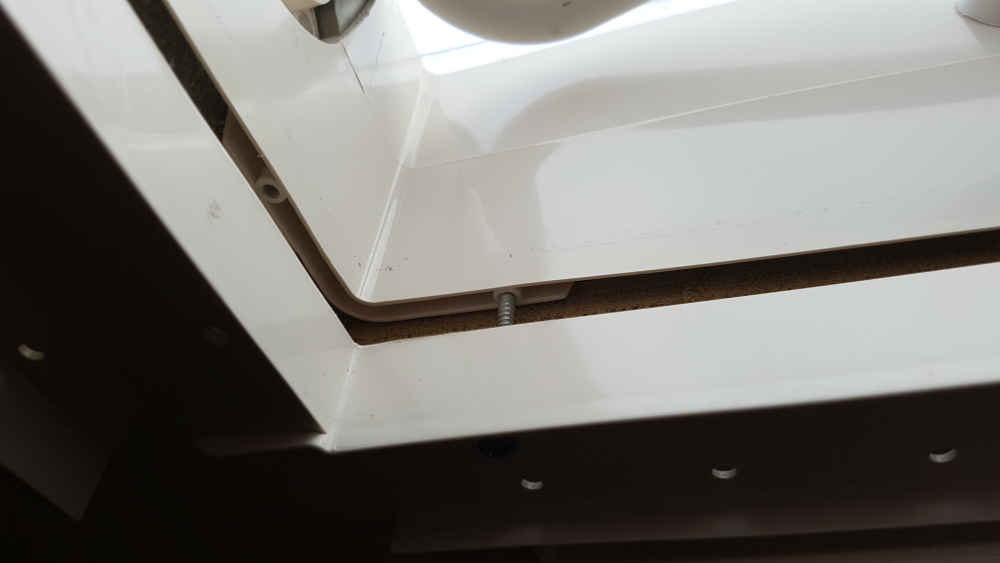 Unscrew the outer flange