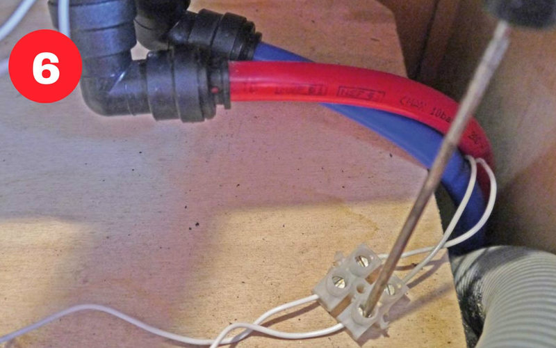 Disconnect the pump wires at the connector block. They are not polarity sensitive.