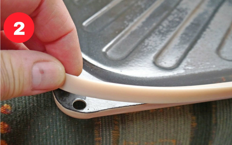 Preserve the plastic sink edge seal for refitting to the new sink later.