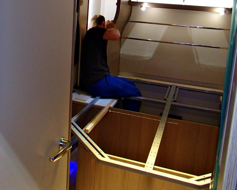 caravan bed mechanisms and doors