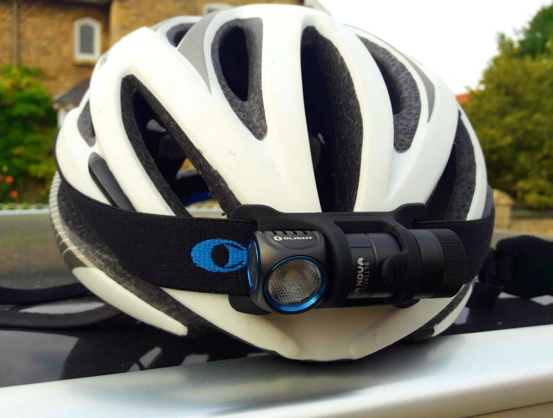 olight H1R Nova on a bike helmet