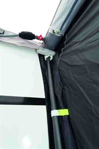 Carbon fibre poles keep the caravan side pad in place
