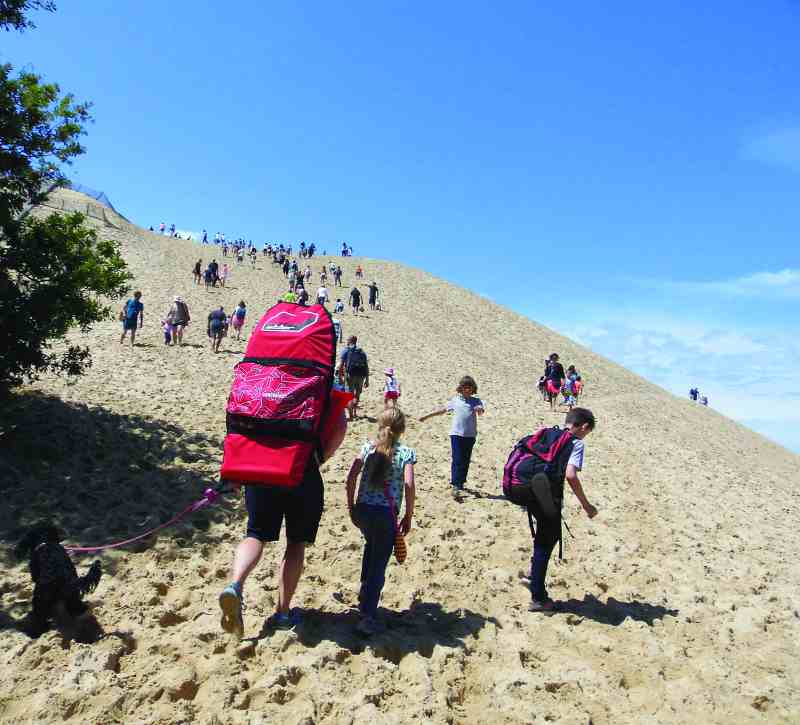 walking up a dune in France