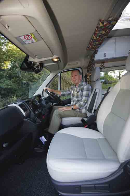 Martin sitting in his campervan