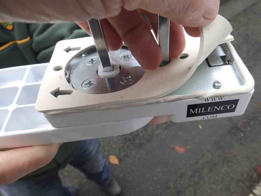 Attaching the gasket to the rear face of the lock