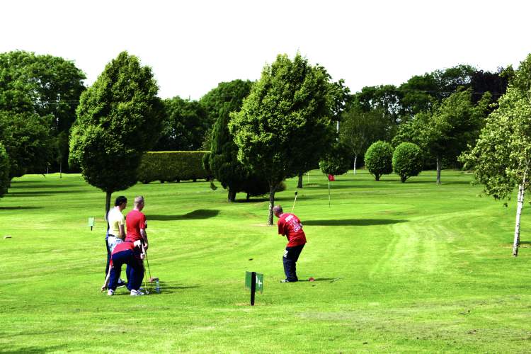 playing golf