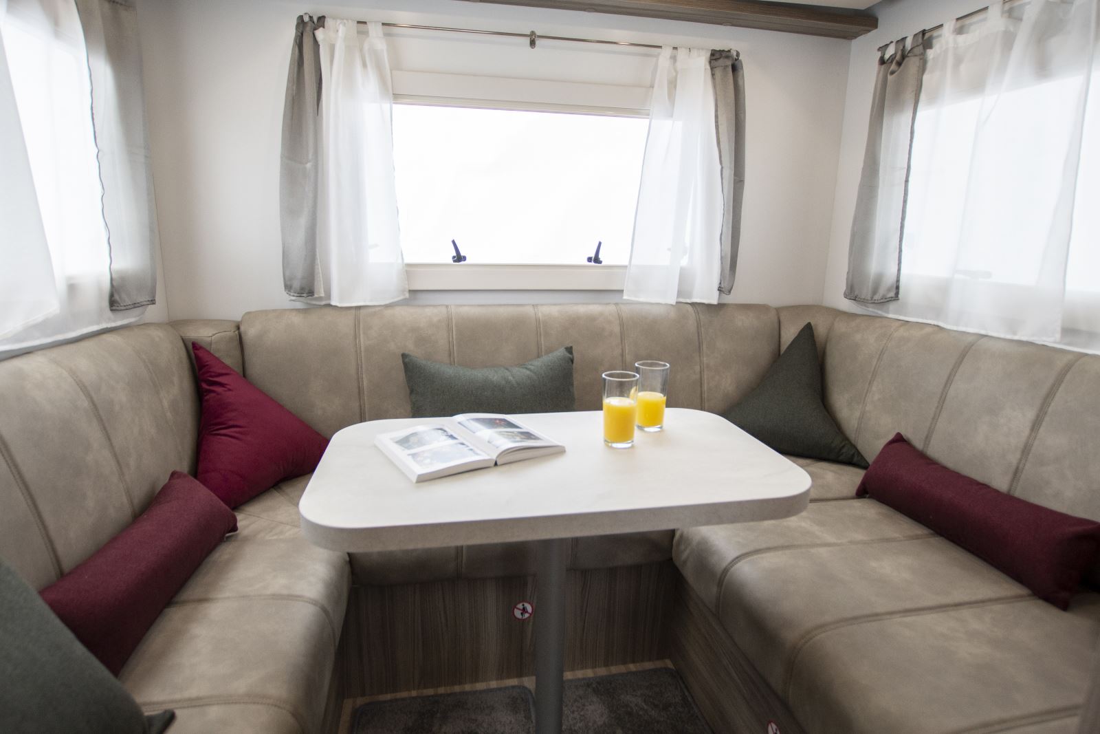 The rear u-shaped lounge in the Benimar Tessoro 482 motorhome