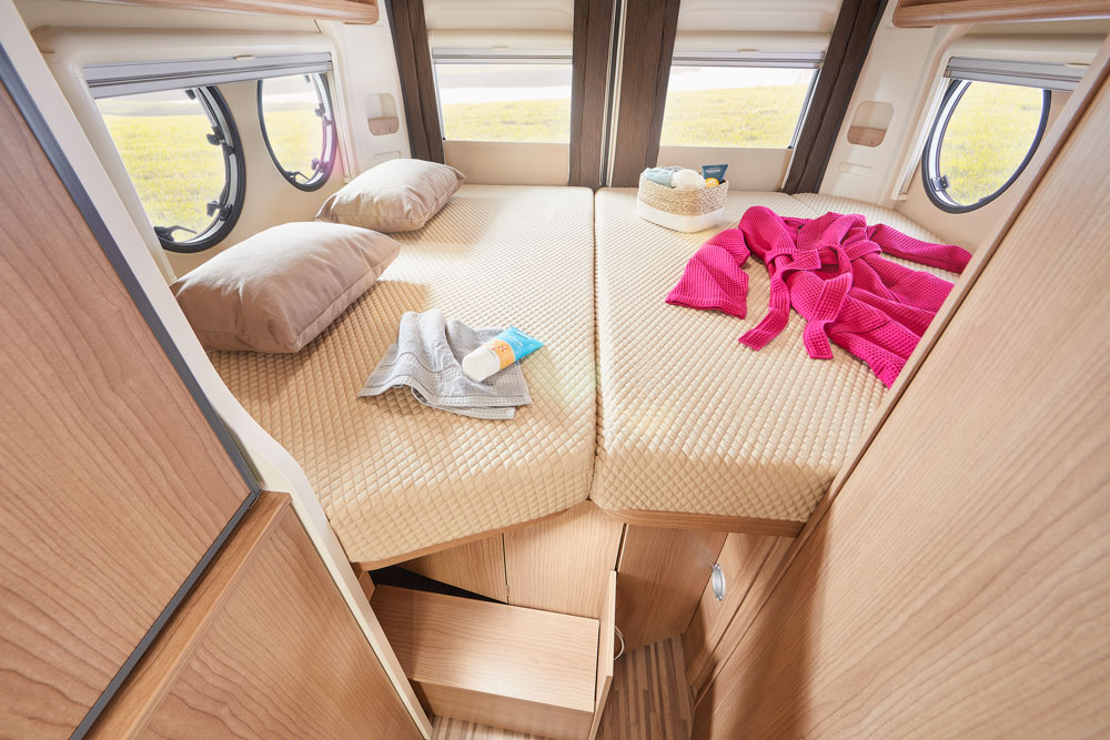 The double bed in the Malibu Van Charming Coupe 600 DB campervan