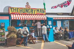 The Hungry Man kiosk situated on the harbourside at Rozel The Hungry Man kiosk situated on the harbourside at Rozel