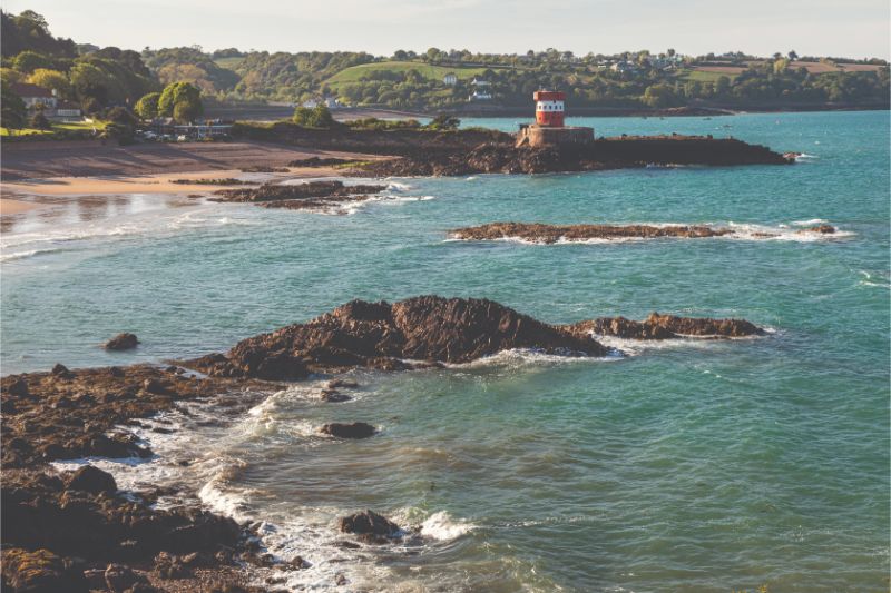 The Archirondel Tower (or Red Tower) and view across St Catherine’s bay The Archirondel Tower (or Red Tower) and view across St Catherine’s bay
