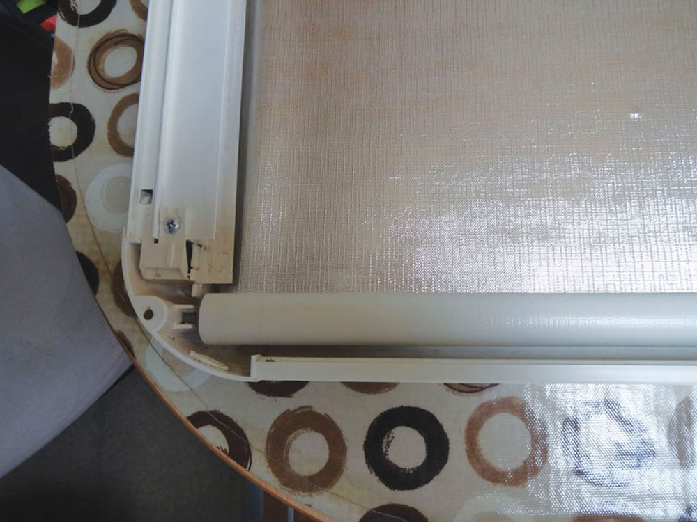 Step two in fixing a roller blind