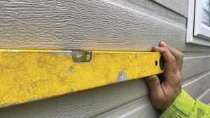 A spirit level is used on all sides