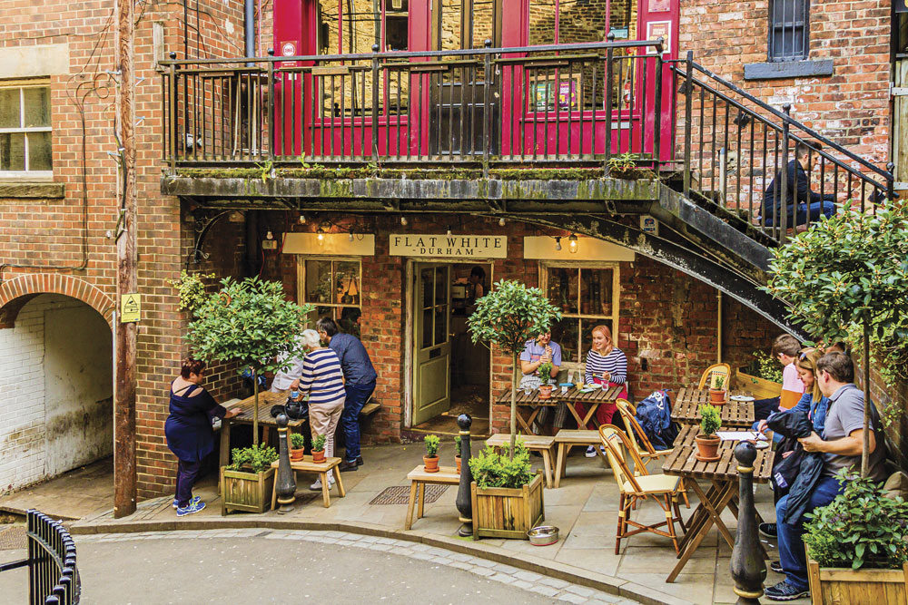 People enjoying coffee in Durham city centre