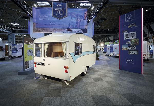 How do you spray paint a caravan safely?
