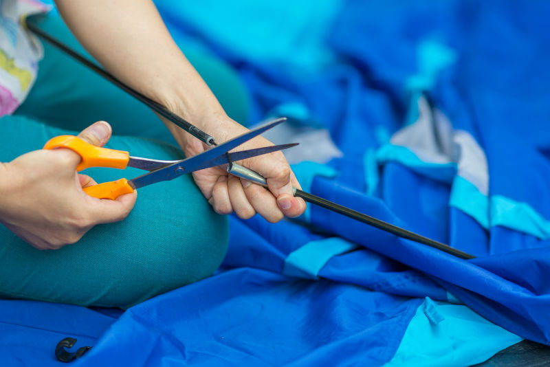 Tent repair (courtesy of Adobe stock)