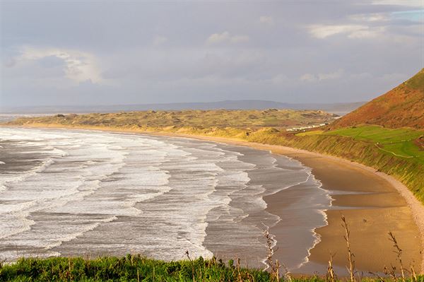 Rhossili Bay (photo courtesy of EdWhiteImages/Pixabay) Rhossili Bay (photo courtesy of EdWhiteImages/Pixabay)