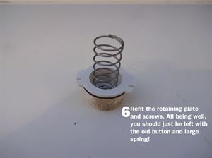Motorhome Door Lock DIY 6: Refit the retaining plate and screws. All being well, you should just be left with the old button and large spring!