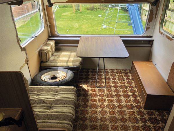 The carpet and the furniture has seen better days... The carpet and the furniture has seen better days...