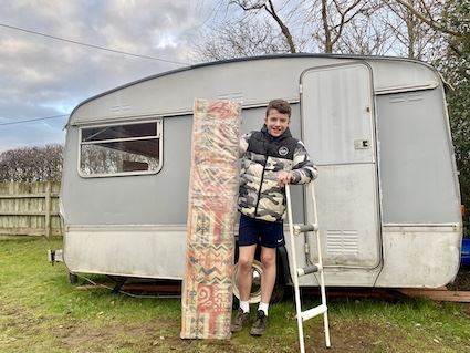 Charlie with the caravan's new bunk bed Charlie with the caravan's new bunk bed