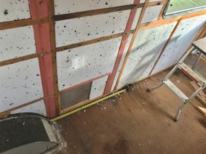 The strengthening battens being fitted The strengthening battens being fitted