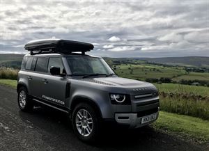 Land Rover Defender on the road Land Rover Defender on the road
