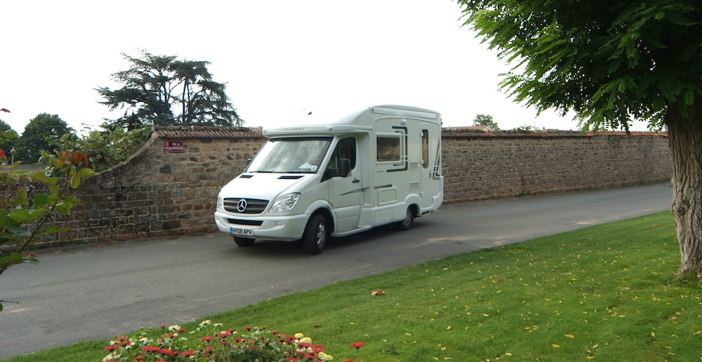 A van towing a boat Wild Camping in France