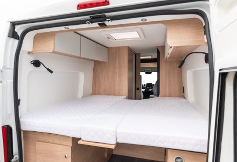 Fixed single beds in the Van 63T The bedroom inside the Joa Camp camper