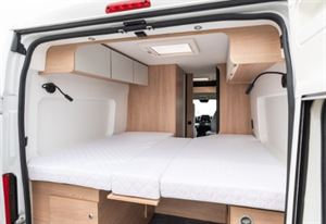 The bedroom on board the camper The bedroom on board the camper