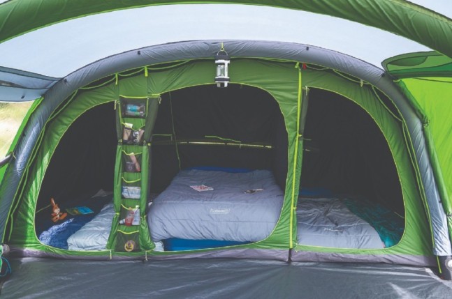 A family using the Weathermaster 6XL Air BlackOut tent