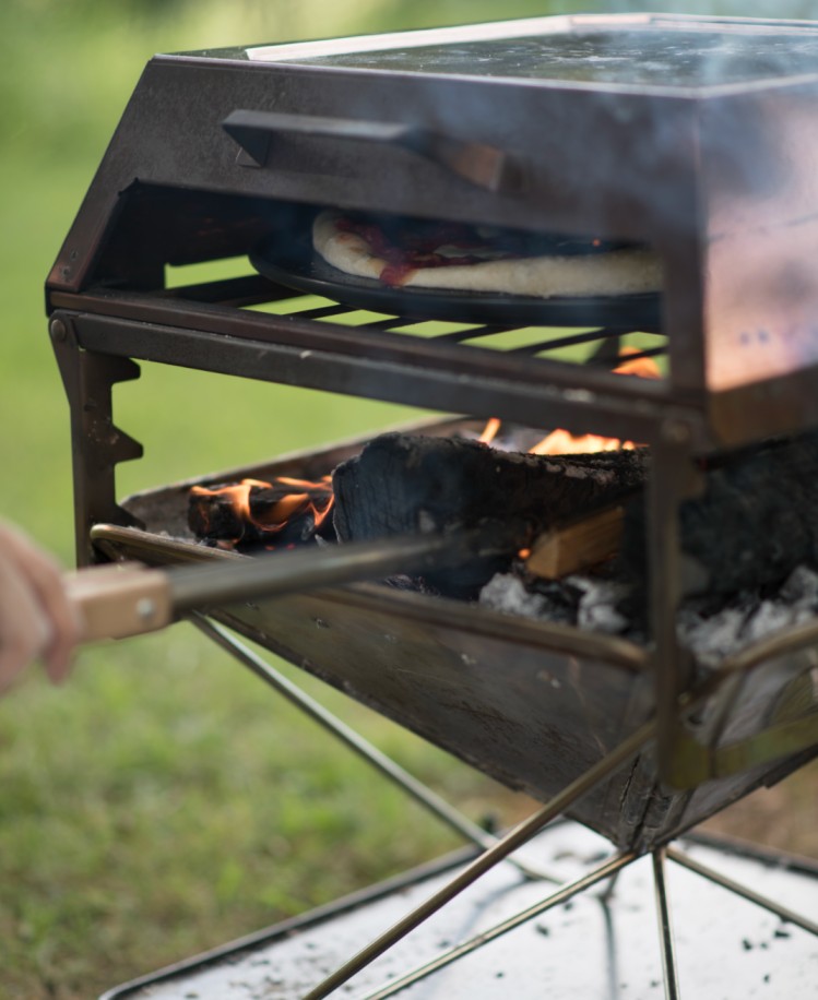 The Snow Peak Field Oven cooking
